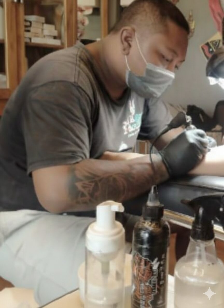 Toley, resident tattoo artist at Rajas Ink